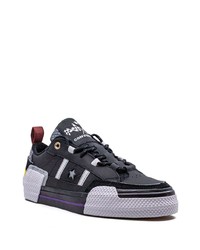 schwarze Leder niedrige Sneakers mit Schlangenmuster von Converse