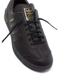 schwarze Leder niedrige Sneakers von adidas