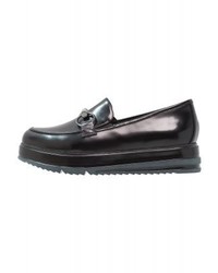 schwarze Leder plateau Slippers von Tamaris