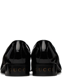 schwarze Leder Slipper mit Quasten von Gucci