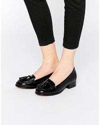 schwarze Leder Slipper mit Quasten