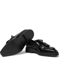 schwarze Leder Slipper mit Quasten von Alexander McQueen