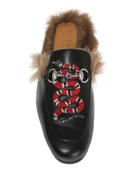 schwarze Leder Slipper mit Schlangenmuster von Gucci