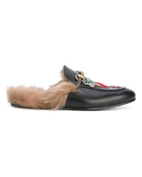 schwarze Leder Slipper von Gucci