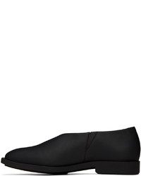 schwarze Leder Slipper von At.Kollektive