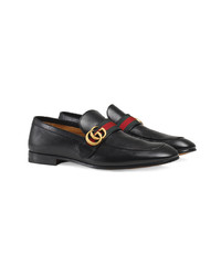 schwarze Leder Slipper von Gucci