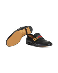 schwarze Leder Slipper von Gucci