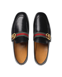 schwarze Leder Slipper von Gucci