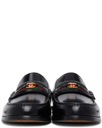 schwarze Leder Slipper von Gucci