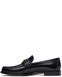 schwarze Leder Slipper von Gucci