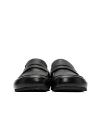 schwarze Leder Slipper von JW Anderson