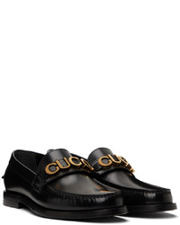 schwarze Leder Slipper von Gucci
