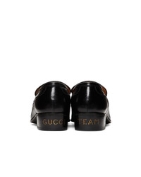 schwarze Leder Slipper von Gucci