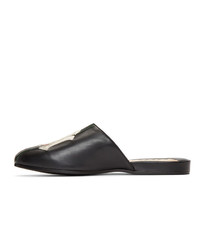 schwarze Leder Slipper von Gucci