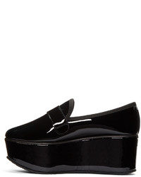 schwarze Leder Slipper von Repetto