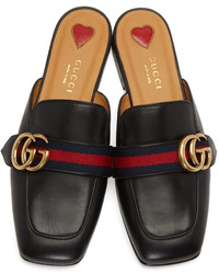 schwarze Leder Slipper von Gucci