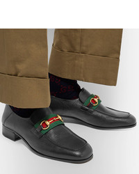 schwarze Leder Slipper von Gucci