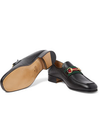 schwarze Leder Slipper von Gucci