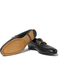 schwarze Leder Slipper von Gucci