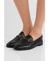 schwarze Leder Slipper von Gucci