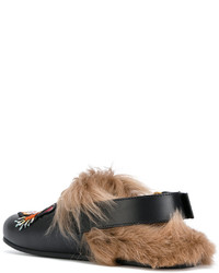 schwarze Leder Slipper von Gucci