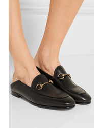 schwarze Leder Slipper von Gucci