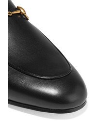 schwarze Leder Slipper von Gucci