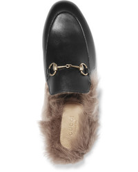 schwarze Leder Slipper von Gucci