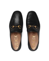 schwarze Leder Slipper von Gucci