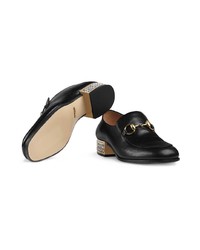 schwarze Leder Slipper von Gucci