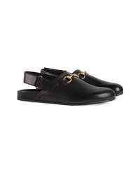 schwarze Leder Slipper von Gucci