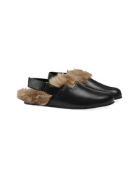 schwarze Leder Slipper von Gucci