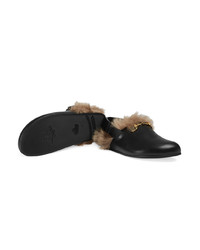 schwarze Leder Slipper von Gucci