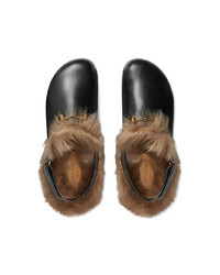 schwarze Leder Slipper von Gucci