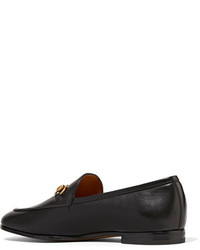 schwarze Leder Slipper von Gucci