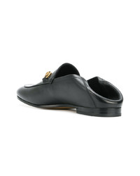 schwarze Leder Slipper von Gucci