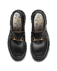 schwarze Leder Slipper von Gucci