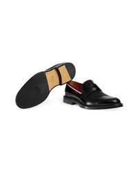 schwarze Leder Slipper von Gucci