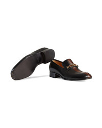 schwarze Leder Slipper von Gucci