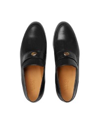 schwarze Leder Slipper von Gucci