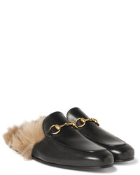 schwarze Leder Slipper von Gucci