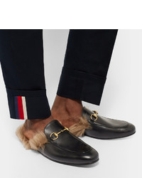 schwarze Leder Slipper von Gucci