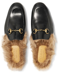 schwarze Leder Slipper von Gucci