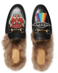 schwarze Leder Slipper von Gucci