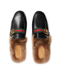 schwarze Leder Slipper von Gucci