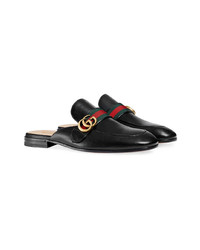 schwarze Leder Slipper von Gucci