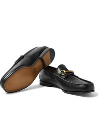 schwarze Leder Slipper von Gucci