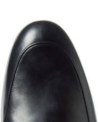 schwarze Leder Slipper von Gucci