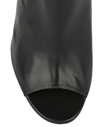 schwarze Leder Stiefeletten mit Ausschnitten von Christian Louboutin