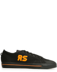 schwarze Leder Turnschuhe von Adidas By Raf Simons